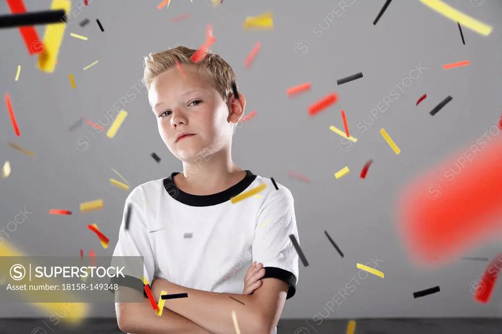 Confident boy in soccer jersey
