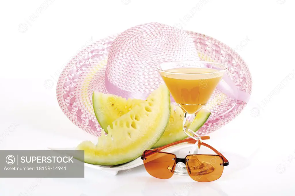 Summer hat, sunglasses and drink, close-up