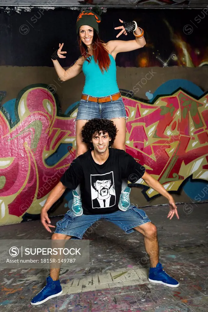 Germany, Stuttgart, Hall of Fame, Two Hip Hop dancers at airbrush wall