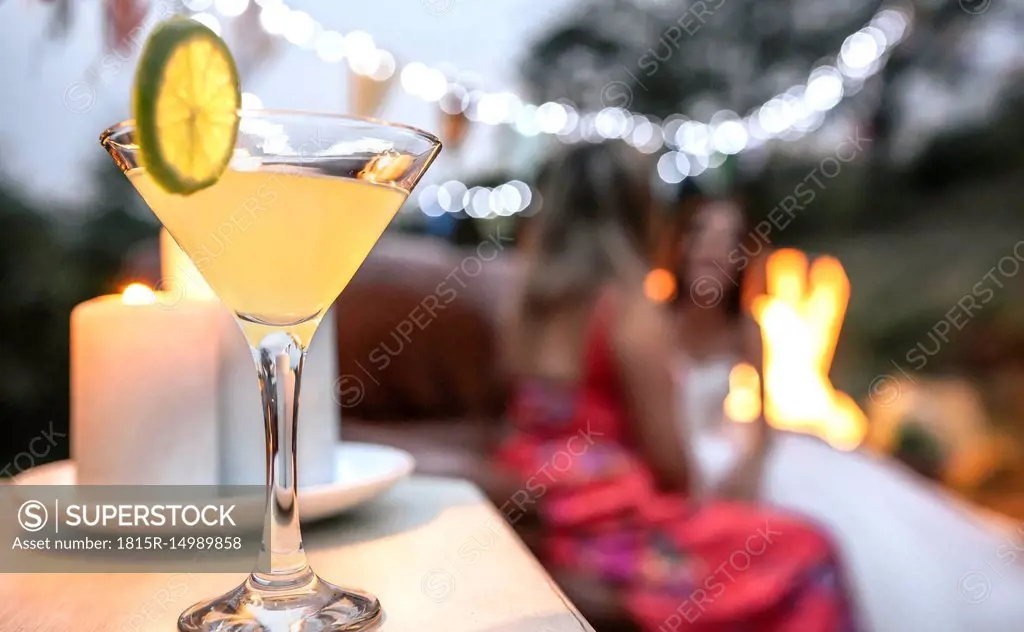 Close-up of lime cocktail ready to drink at an outdoor party