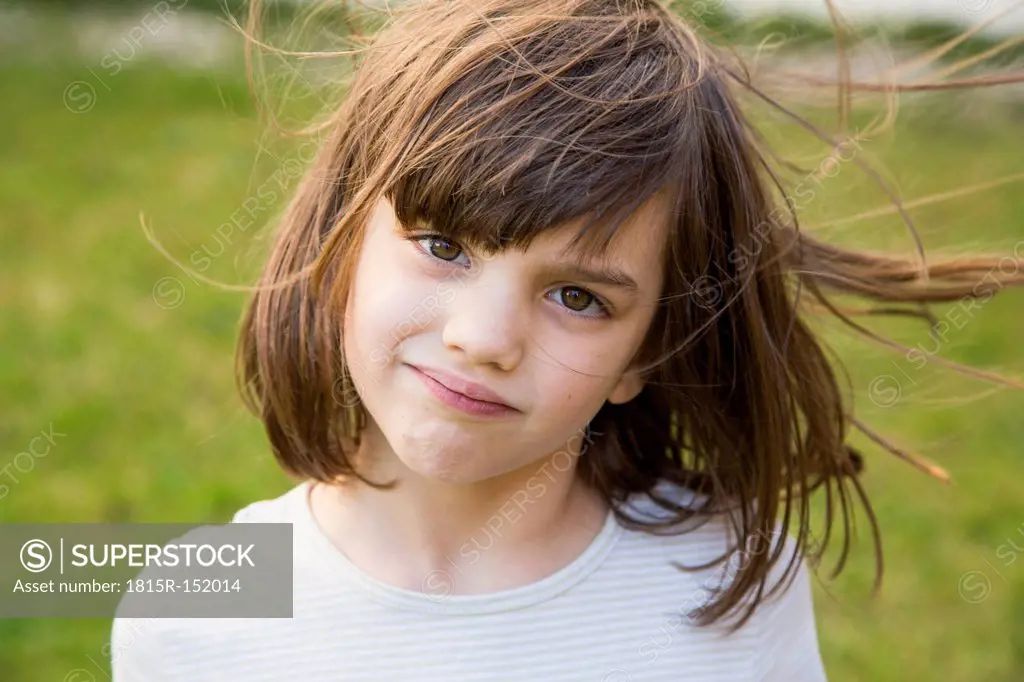 Portrait of little girl with wafting hair