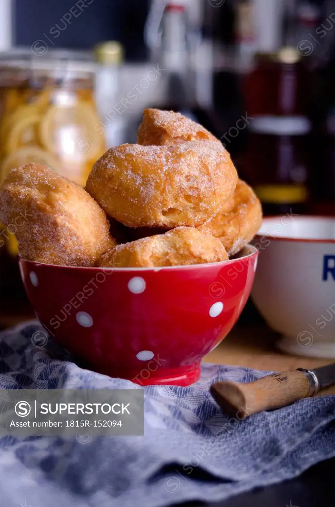 Bowl with curd doughnuts