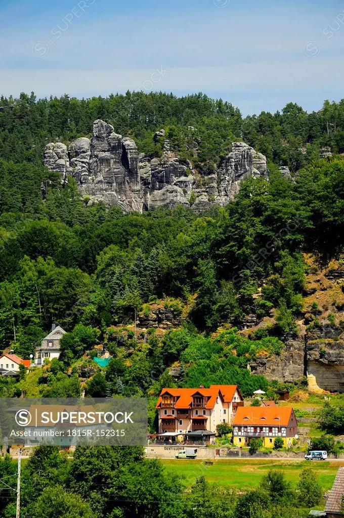 Germany, Saxony, Rathen, Houses and Elbe Sandstone Mountains