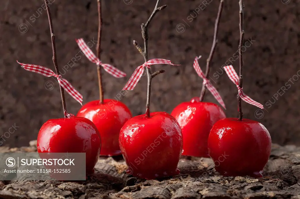 Candied apples with branches as stick