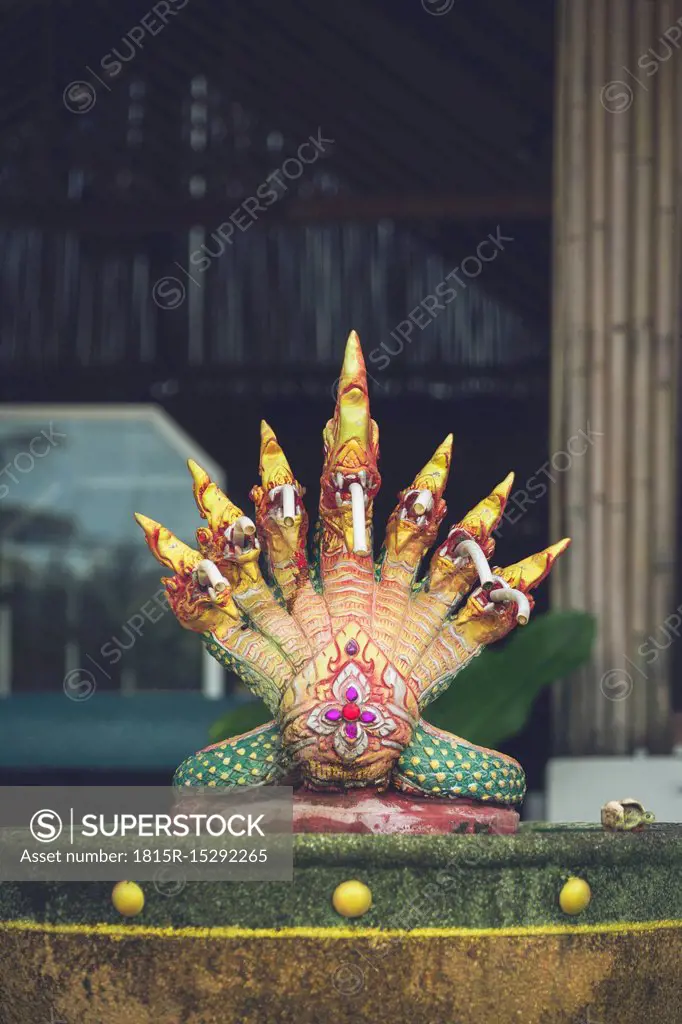 Thailand, Khao Lak, Buddhist snake sculpture on a fountain