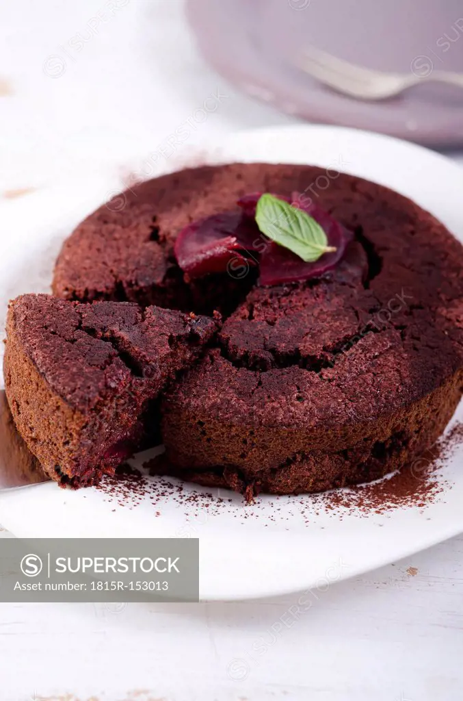 Chocolate cake with slice of beetroot, studio shot
