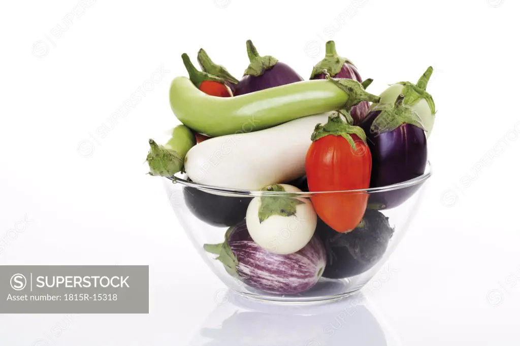 Aubergines in bowl, close-up