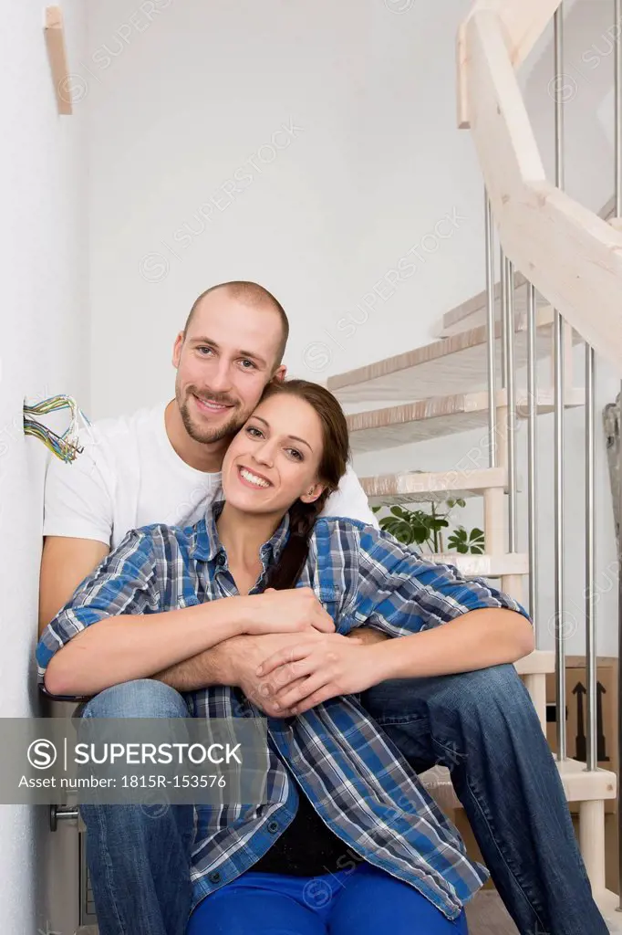Happy young couple in new home