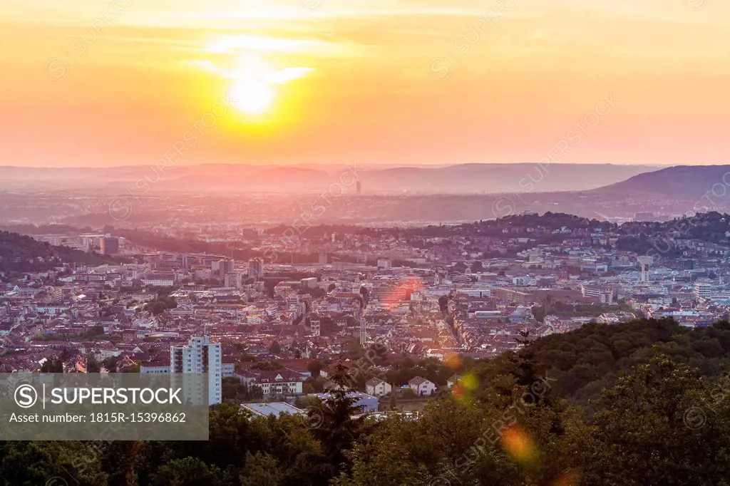 Germany, Baden-Wuerttemberg, cityscape of Stuttgart at sunrise, view from Birkenkopf