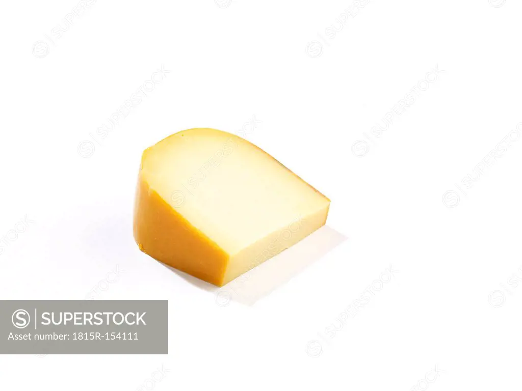Piece of Gouda cheese, studio shot