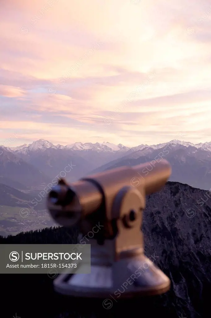 Austria, Tryrol, View of Alps with telescope in foreground