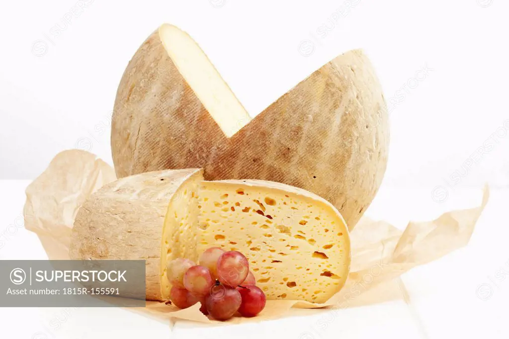 French Bethmale cheese and grapes on greaseproof paper