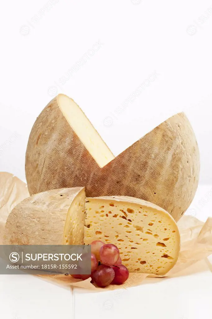 French Bethmale cheese and grapes on greaseproof paper