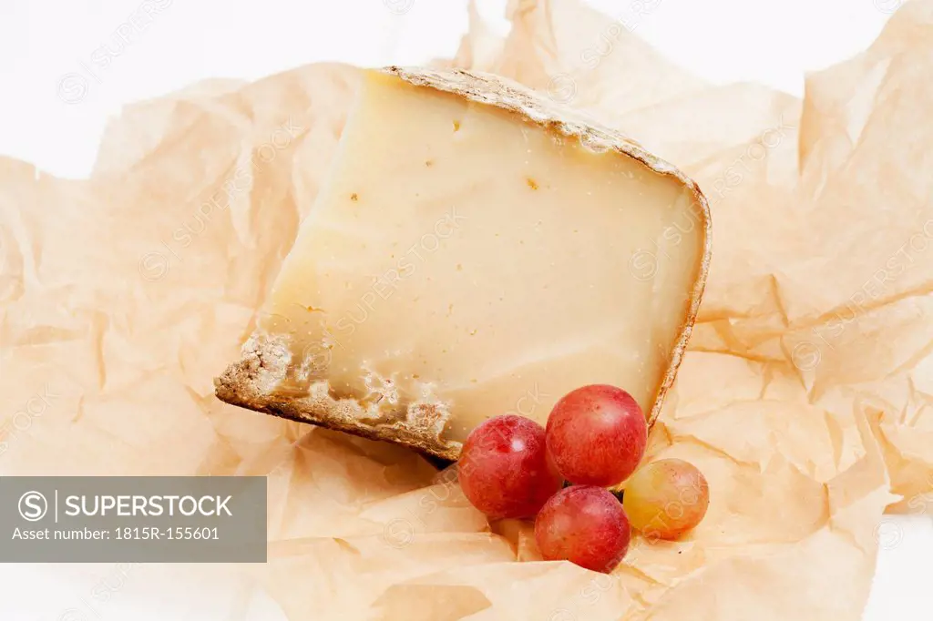 French ewe's cheese, grapes and greaseproof paper