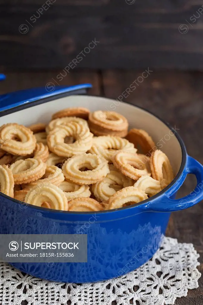 Taditional spritz cookies in blue cooking pot