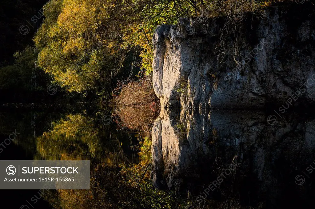 Germany, Baden Wuerttemberg, View of Upper Danube Nature Park, water reflection in autumn