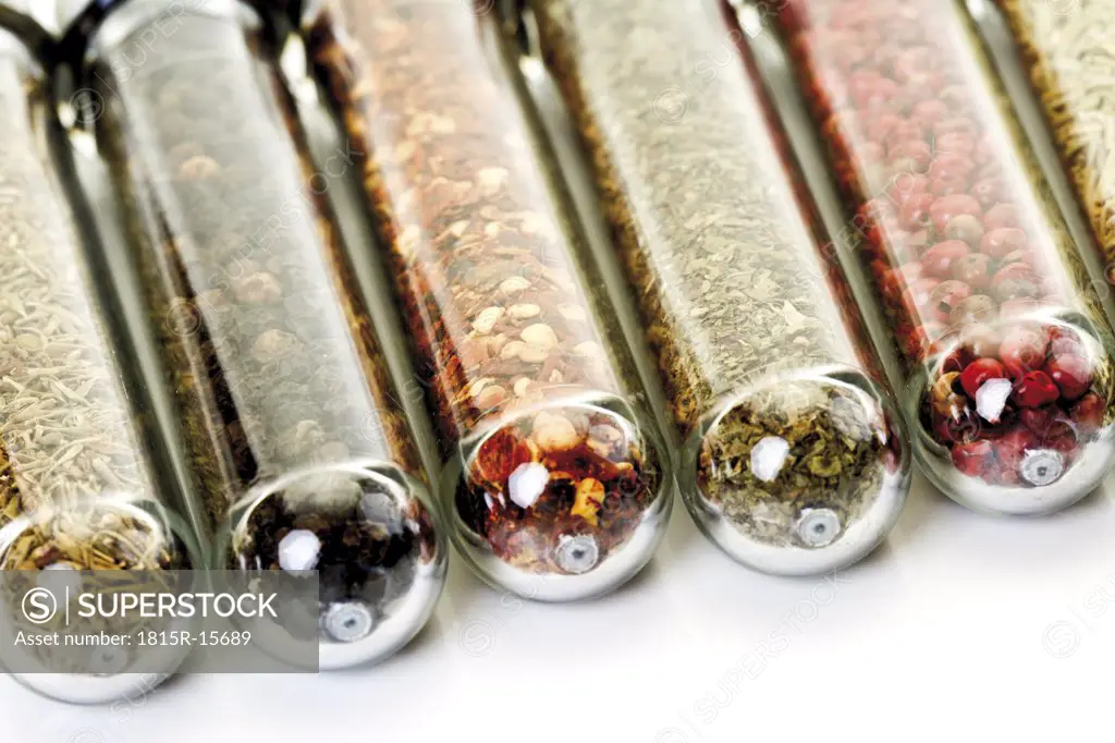 Variety of dried spices in glasses, close-up