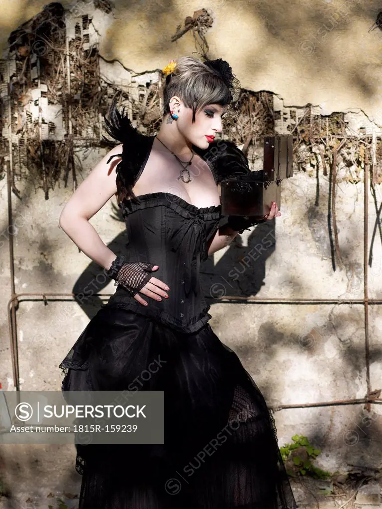 Young woman wearing Steampunk clothing, Victorian style
