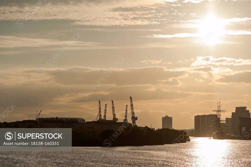 Great Britain, Scotland, Glasgow, River Clyde, dock area, backlit photo