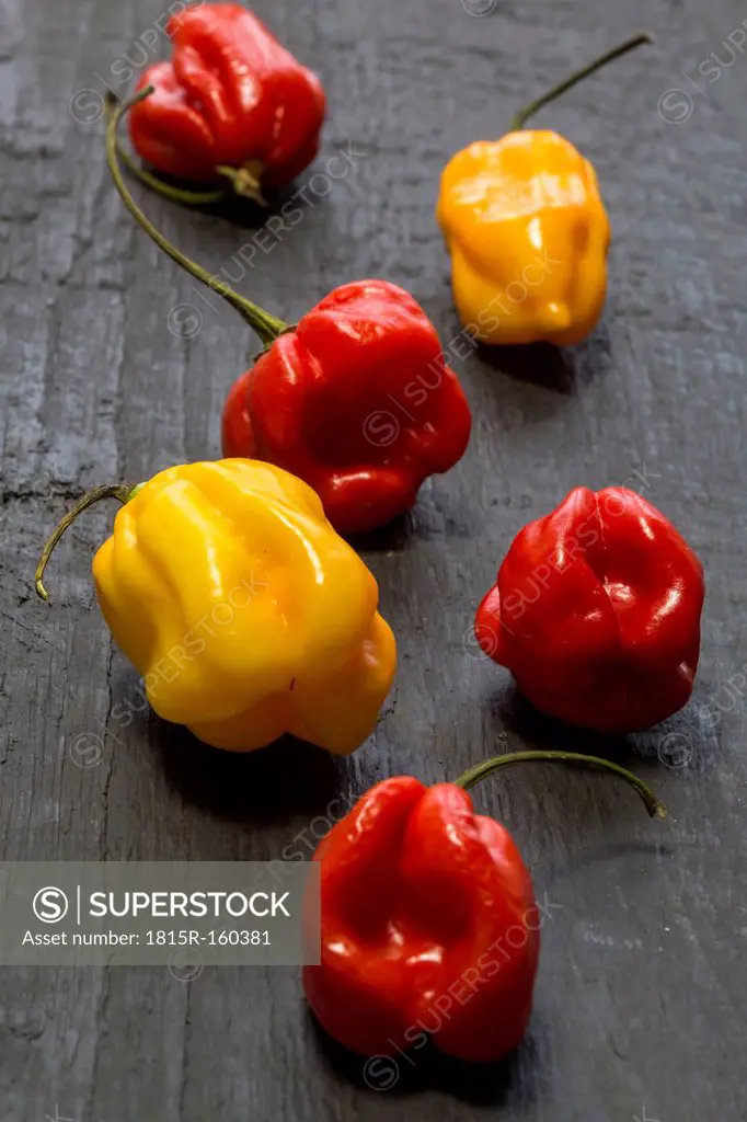 Habanero peppers on wooden table