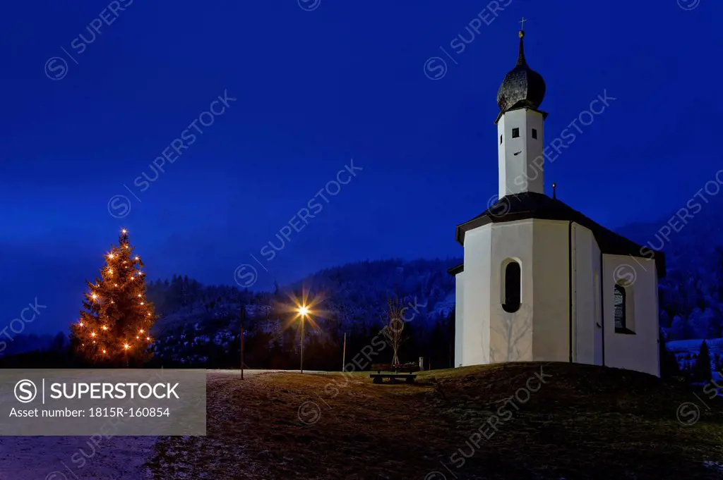 Austria, Tyrol, Schwaz, Achenkirch at Achensee, St. Anna and lighted christmas tree