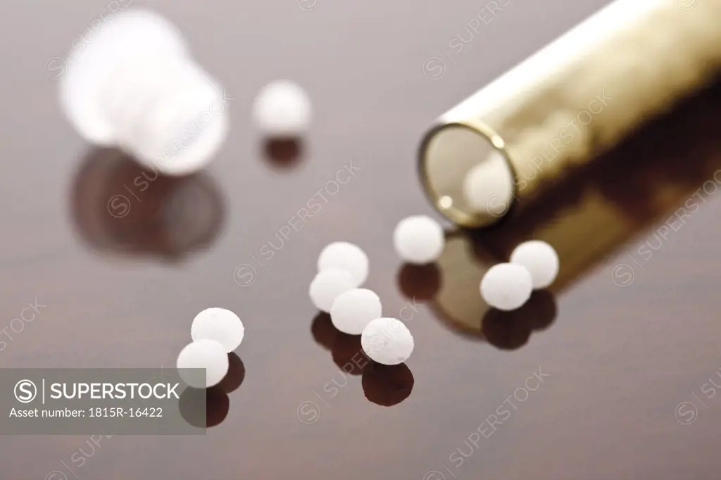 Homeopathic globules in glass tube