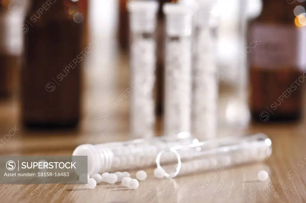 Homeopathic Pills in glass tubes, close-up