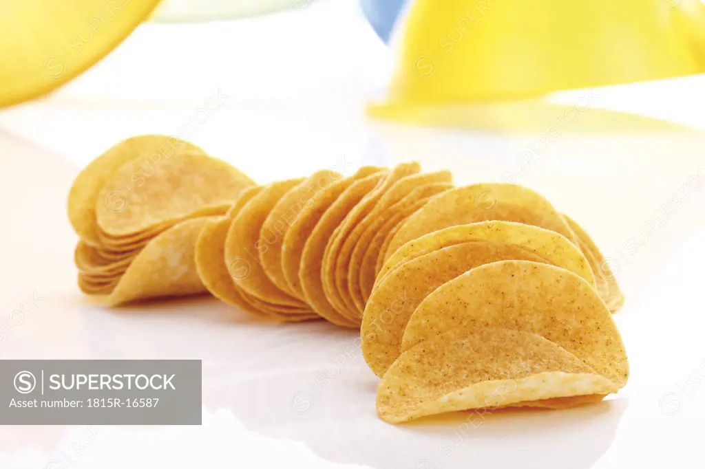 Potato chips in a row, close-up