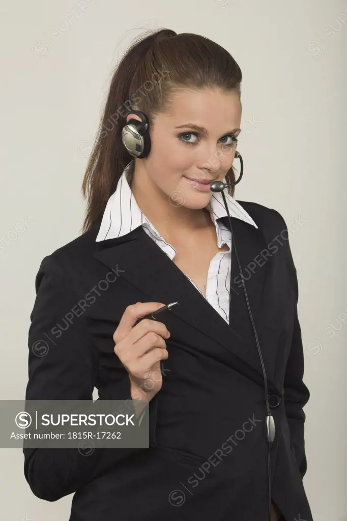 Young woman wearing headphones, portrait