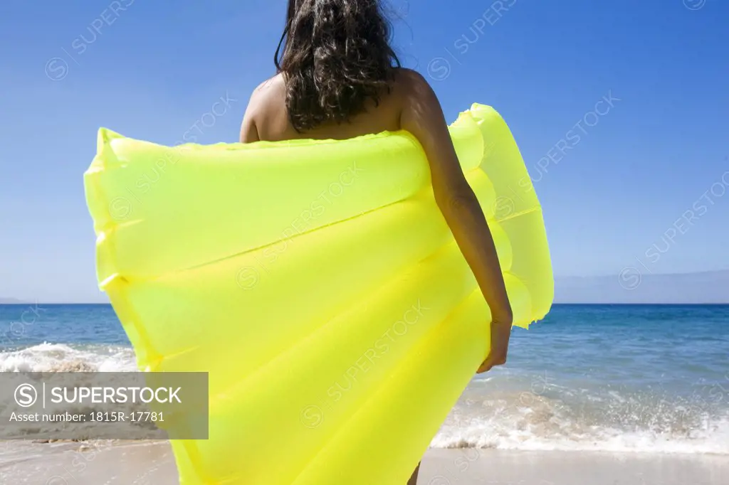 Woman holding airbed