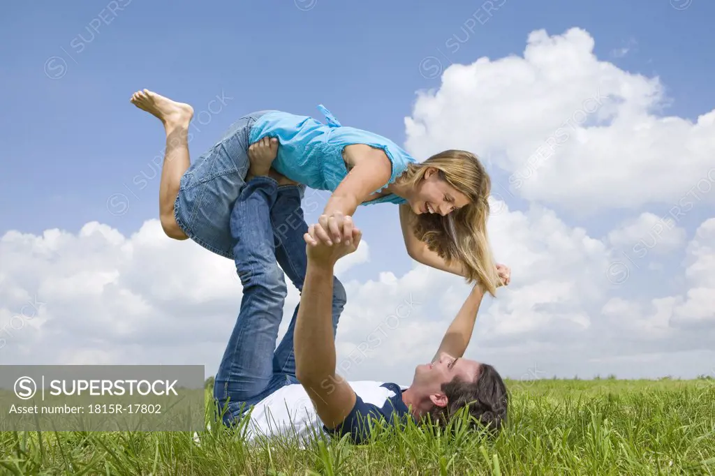 Man lifting woman