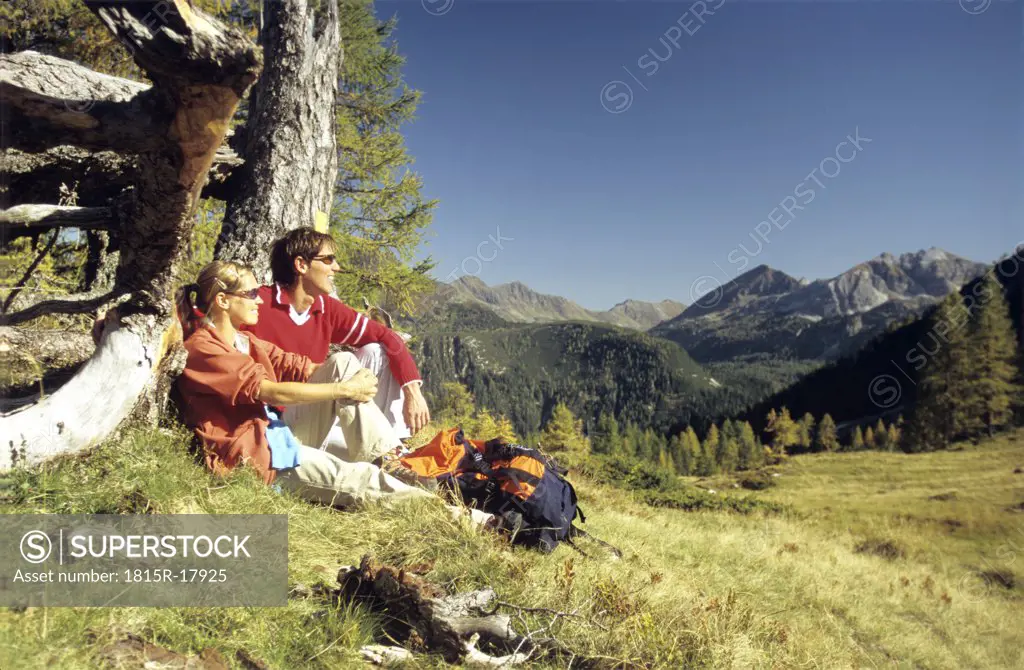 Couple having a break in the moutains