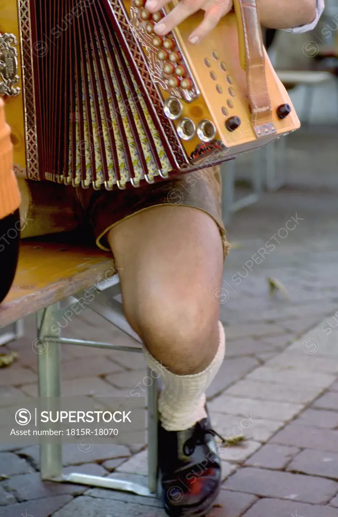 Austria, Man playing accordion, low-section