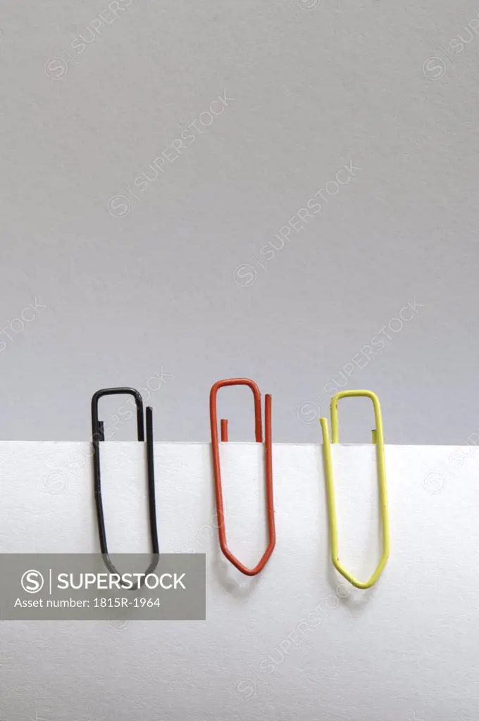 Three paperclips in German national colours