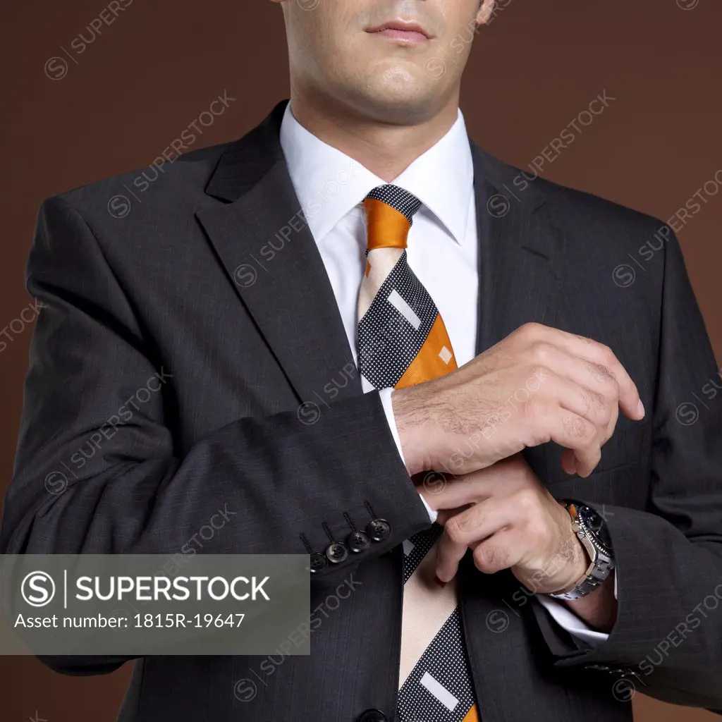 Businessman wearing suit and tie, close-up
