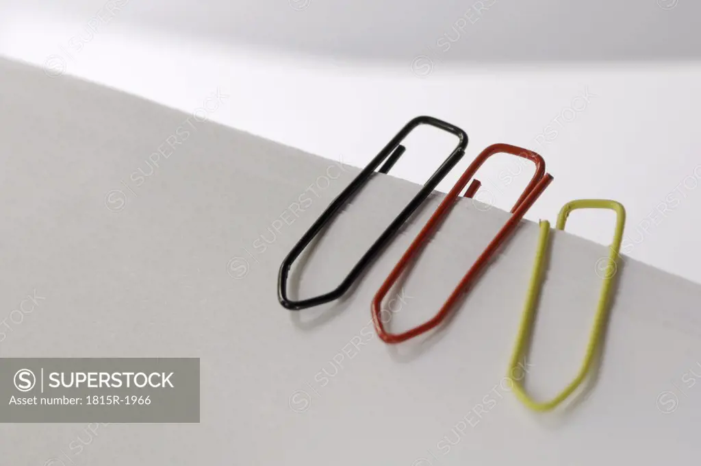 Three paperclips in German national colours