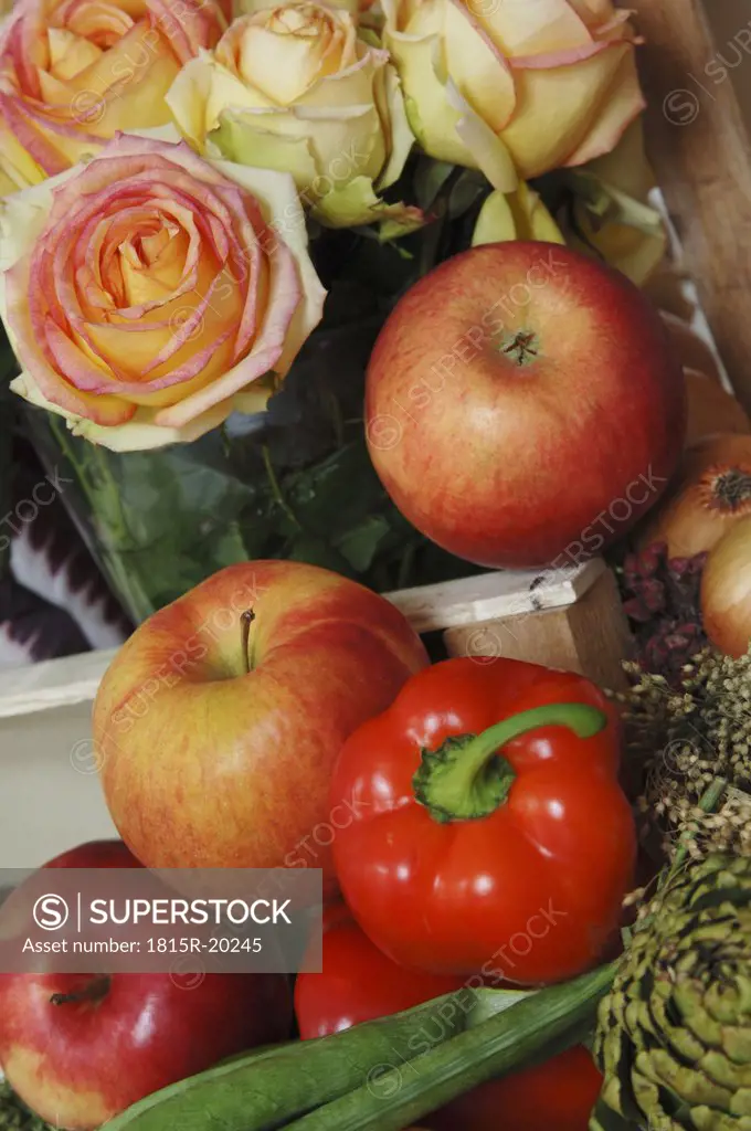 Vegetables apples and roses, still life