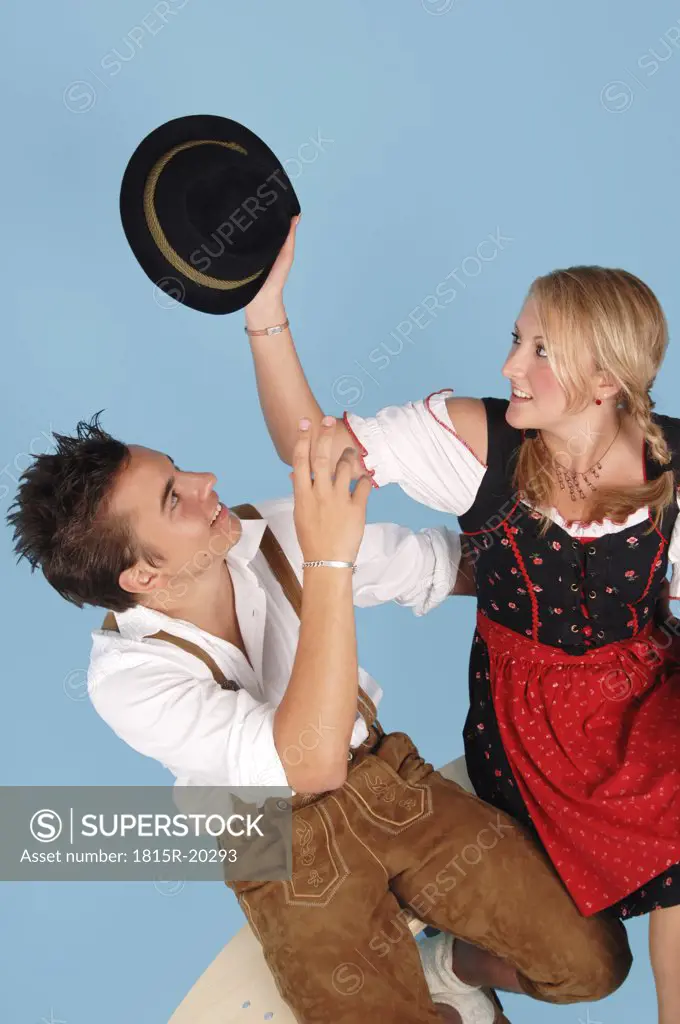 Young couple wearing Bavarian costume, elevated view