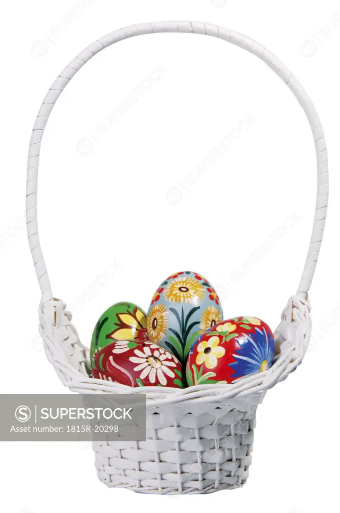 Easter eggs in white basket