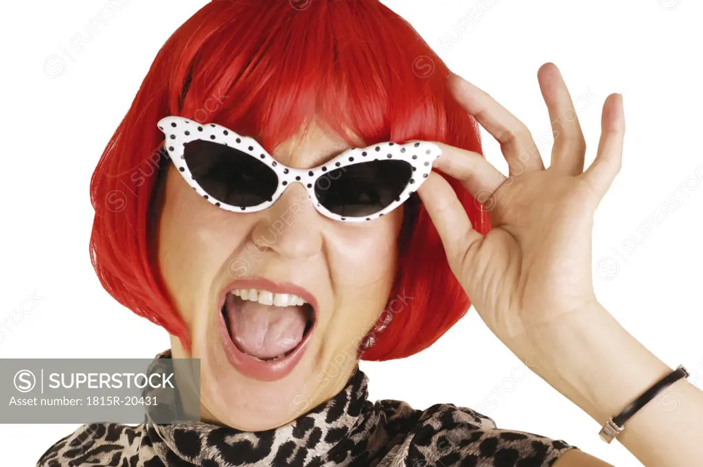 Woman wearing sunglasses and wig