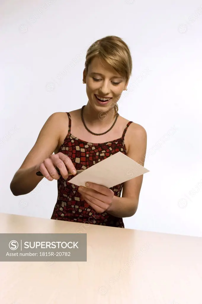 Young woman with envelope