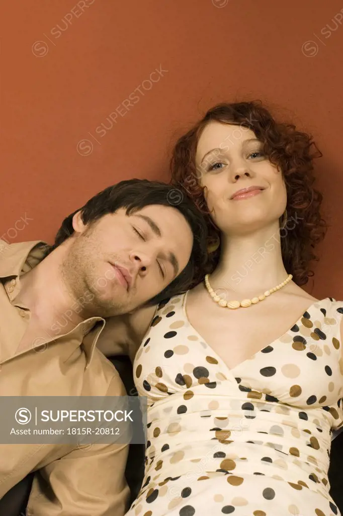 Man leaning on woman's shoulder, elevated view