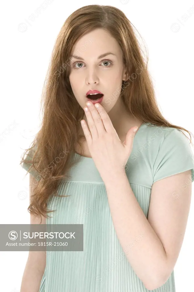Young woman, hand on mouth, portrait