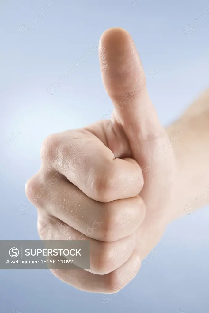 Hand gesture, thumbs up, close-up