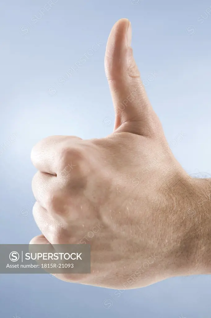 Hand gesture, thumbs up, close-up