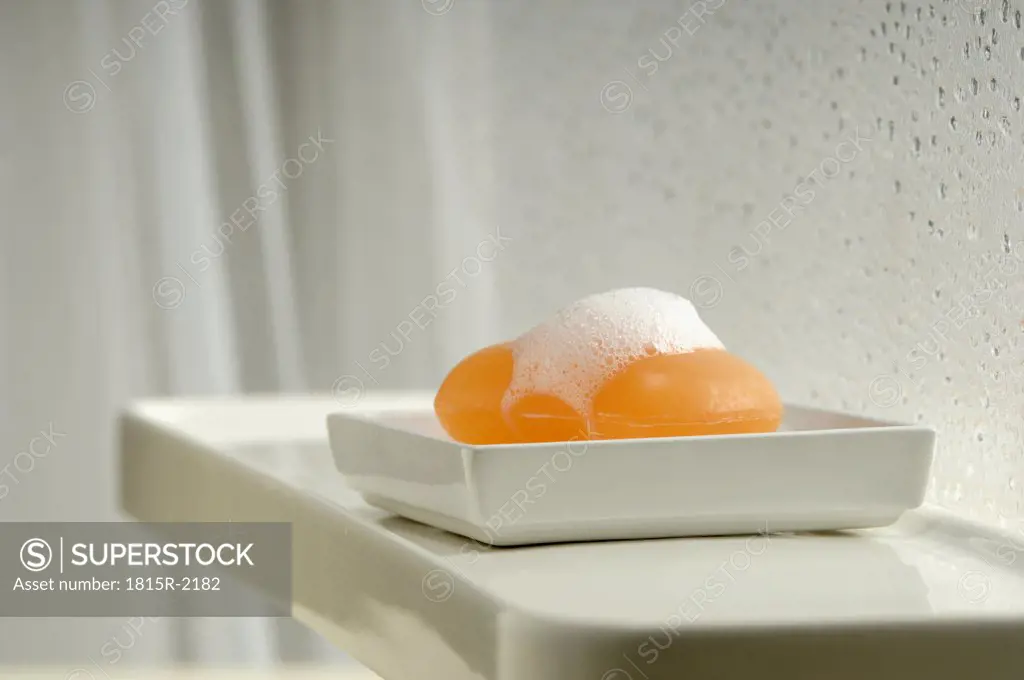 Soap with foam in soap dish