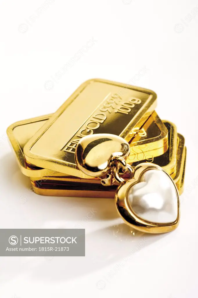 Gold bars and heart-shaped pedant