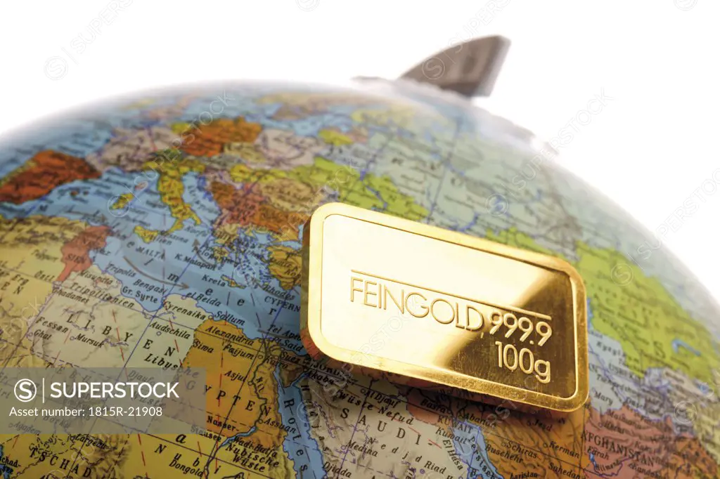 Gold bar on globe