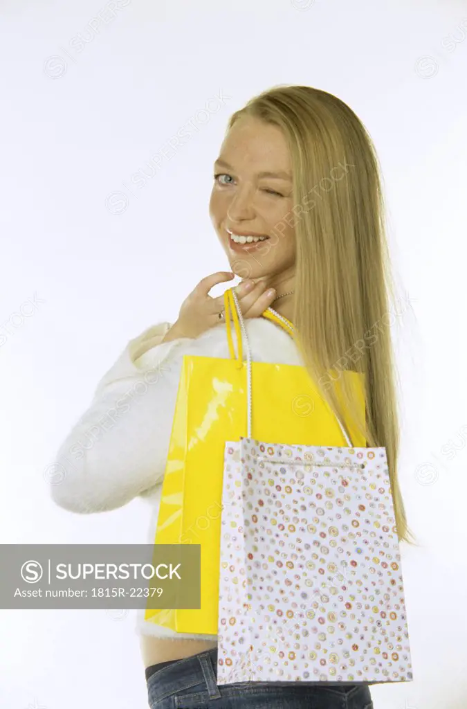 Young woman with paperbag