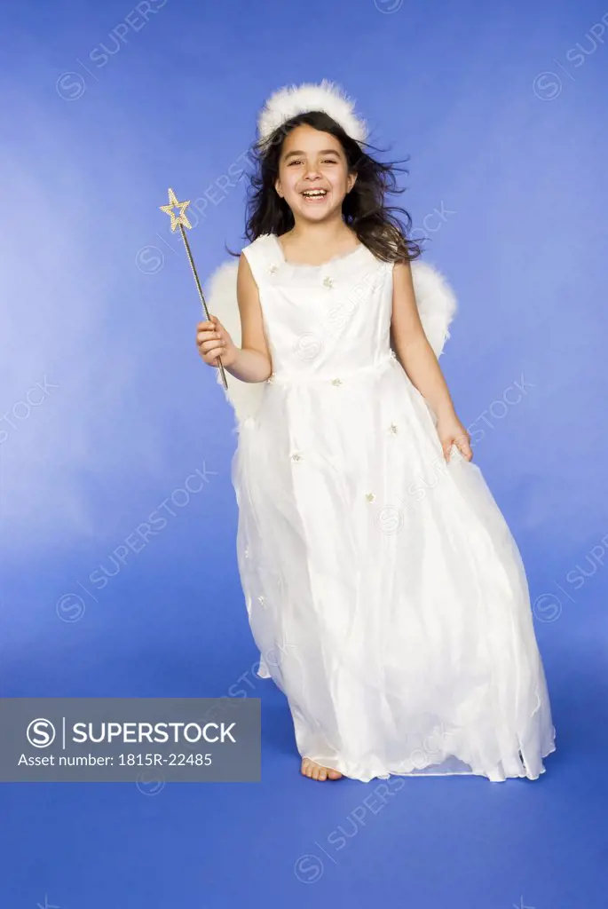 Girl dressed as angel, portrait